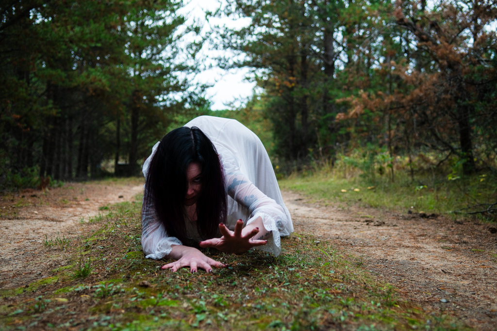 Scary crawling girl