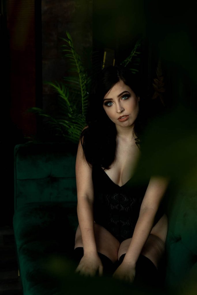 Very dark green image girl on sofa